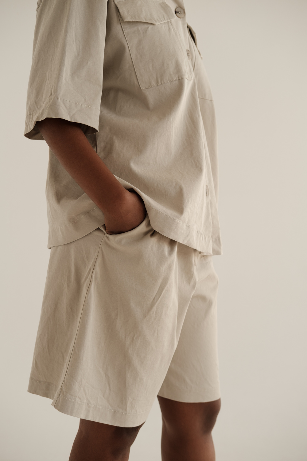 Woman in Casual Shirt and Shorts