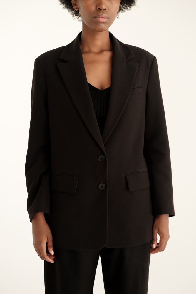 Woman in Black Blazer and Slacks