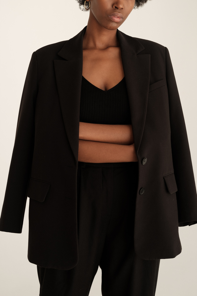 Woman in Black Blazer and  Slacks